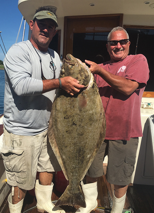 This 52.4 pound halibut inhaled a butterfly jig east of Stellwagen.