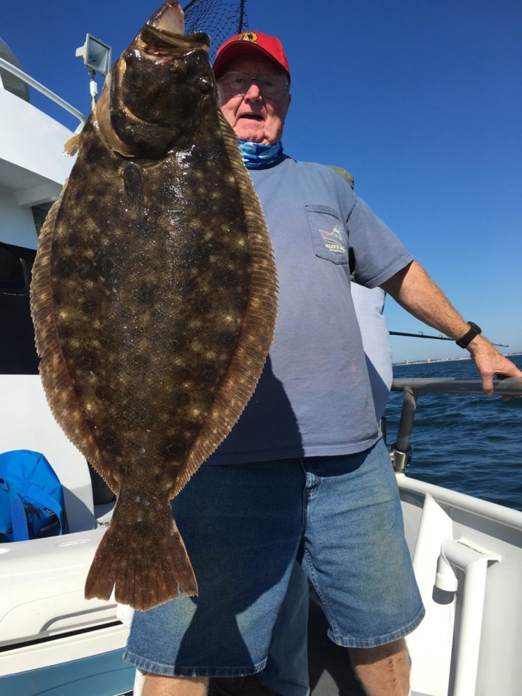 Keith McCoy of Yardville with a 9.8-pound fluke caught aboard the Skylarker out of Belmar.