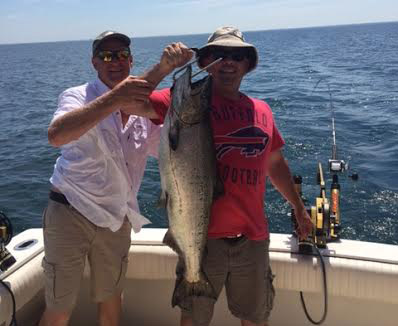 Tim Sylvester with Mark Clark with 31 pound king.