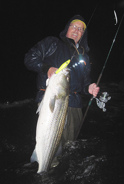 The most important element of this photograph is the time of day it was taken - after dark! Remember, surf fishing for stripers with artificial lures during the summer months is absolutely the best after the sun goes down.
