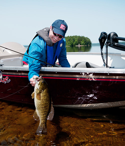 Dragging bottom with a tube fooled this shallow-water smallmouth for the author. 
