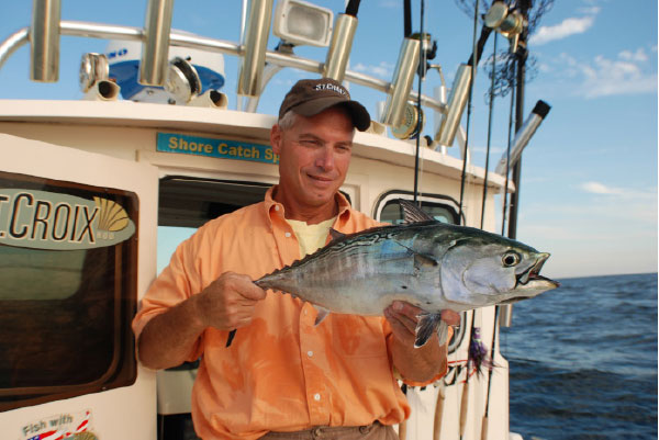 The author holds up a nice New Jersey false albacore.