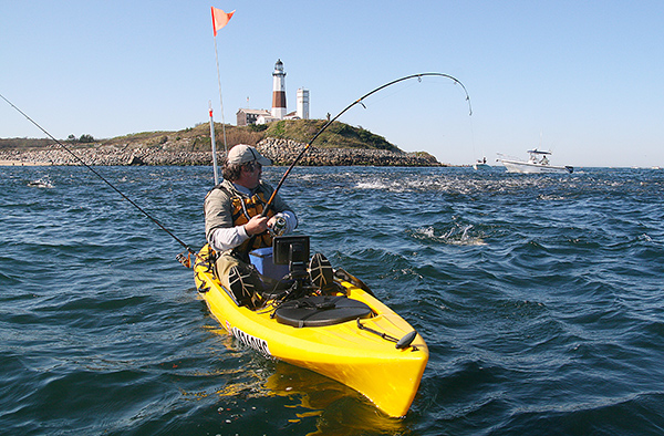 Paul battles a striper during an intense blitz.
