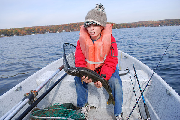 Matt Litton holds a fat fall walleye.
