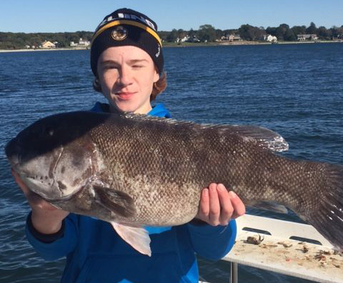 Michael Ulitsch&rsquo;s 15-year-old son Michael caught this 13-pound tautog on opening day of the season in Niantic, CT.