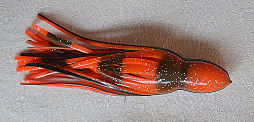 A trimmed skirt slid over a strip bait allows it to swim straight.