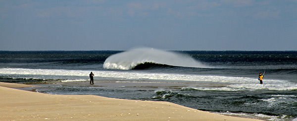 anglers wade onto sand bar