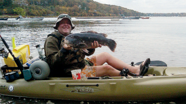 The author with a big tautog taken in shallow water.