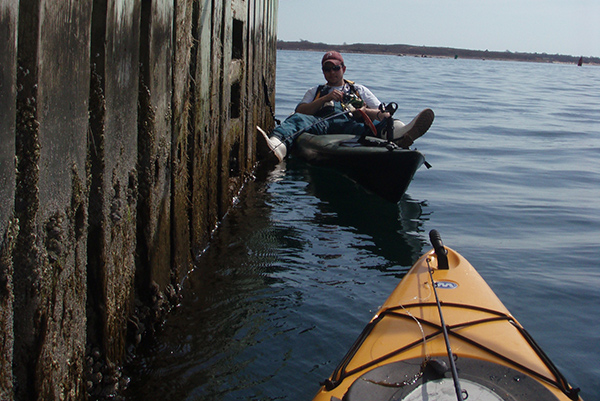 Wedging the kayak between pier or bridge pilings (or using the pedal-drive to maintain your position) allows more freedom of movement.