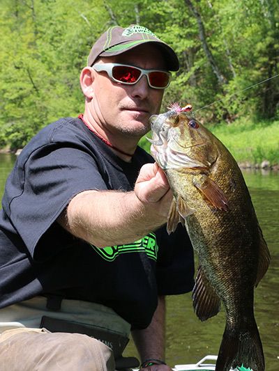 A curly-tail grub on a leadhead jig remains a deadly lure for smallmouth bass.