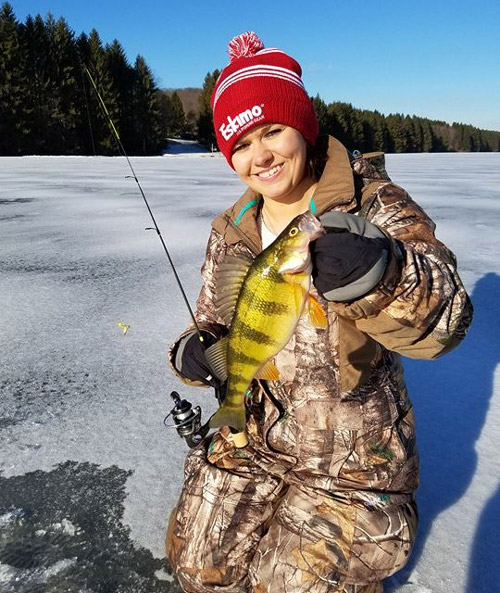 A FIRST!! Hills Creek Lake was the lake that Miranda Hendrix chose to experience ice fishing for the first time. While on her inaugural trip, she caught a Yellow Perch.