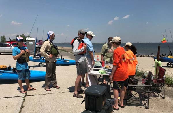 Anglers waiting to get trash weighed