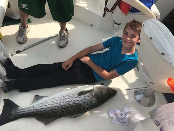 Last weekend, anglers were finding stripers up to 40 pounds between Deer Island and Short Beach like this one reeled in by 15-year old Kerdina
