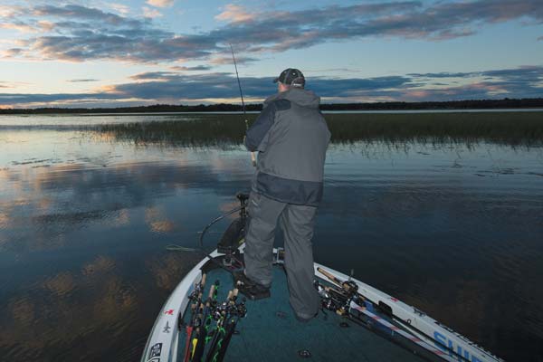 Craig Lister works a shallow bay at dusk, swimming a Jackall Ammonite Shad.