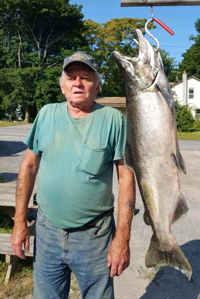 Joe Szcafranski of West Seneca with a king off the Olcott Pier.