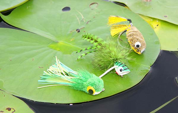 The big three: frog, cork popper and mouse patterns. The author favors green or yellow for both the frogs and corks, but brown is the standard color for mouse imitations.