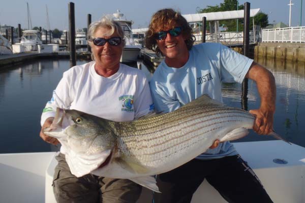 Maureen Klause holds the 4-pound-test line class record for striped bass