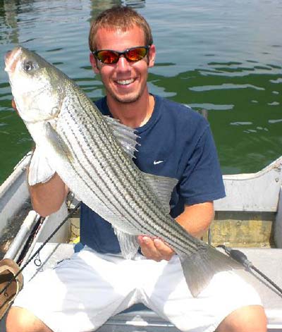 A back-bay striper taken on clam bellies in the middle of the day