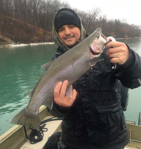 Ryan O'Neill with a river steelhead.