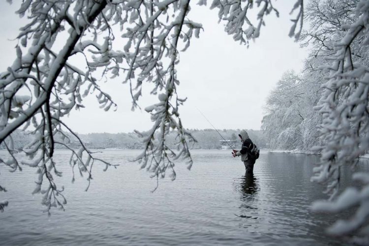 Winter trout fishing in the snow