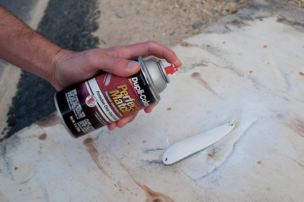 Spray-paint the spoon with several coats