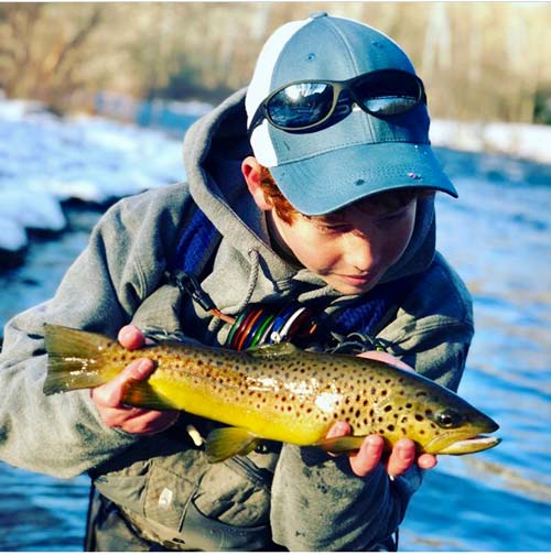 Young angler Ryan Peck with a nice Farmington brown.