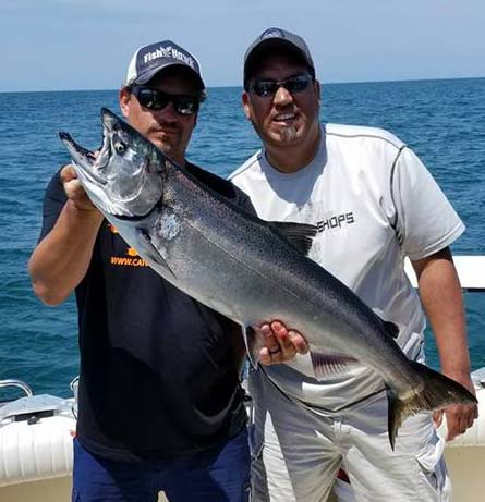 Matt Yablonsky holds up the 2nd place king for Bill Santana of Wilson in the Sabres alumni outing
