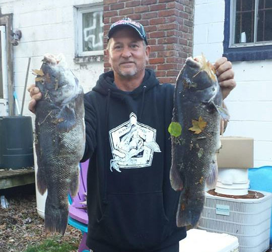 Tom with two nice blackfish