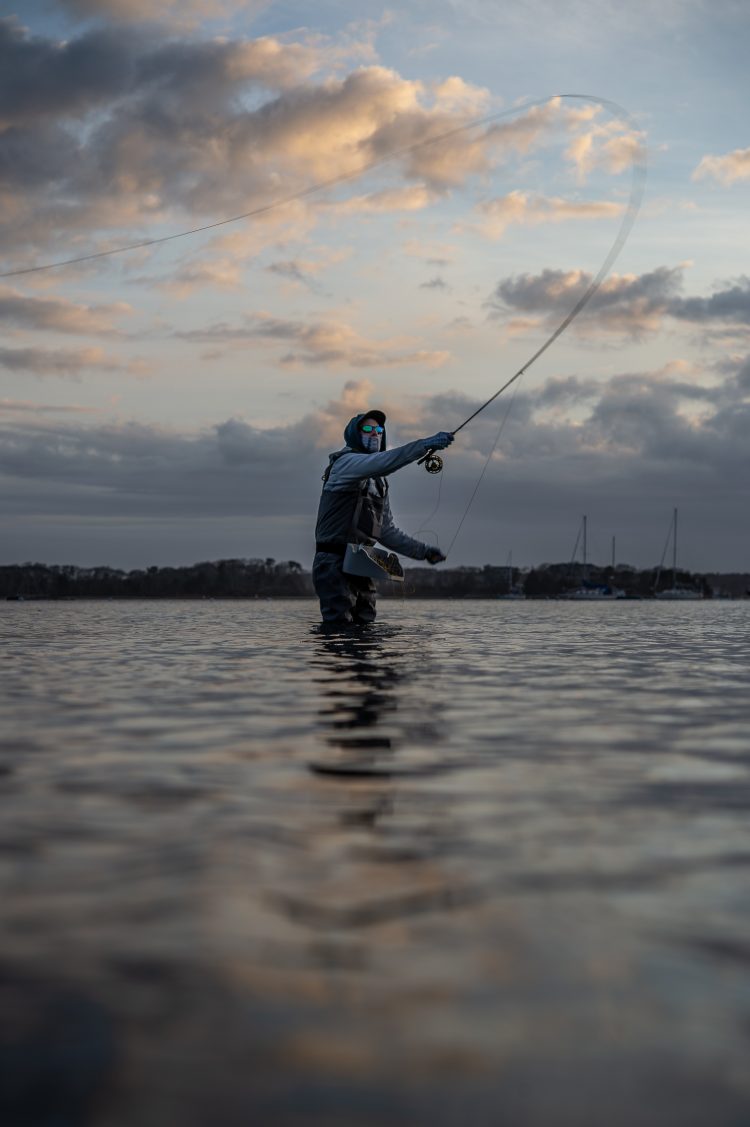 Kevin Blinkoff searching for stripers with a fly rod in early May.