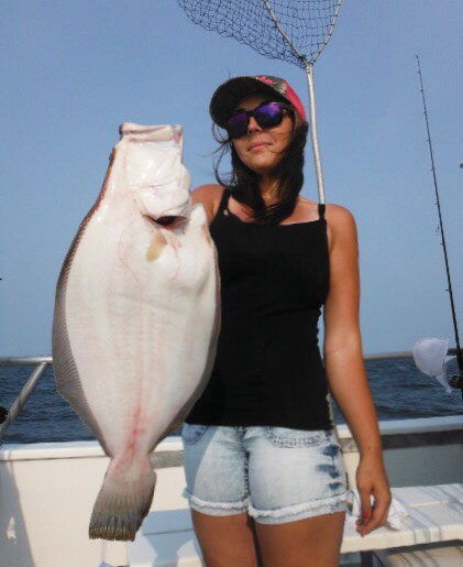 The author with a big fluke aboard the Dorothy B