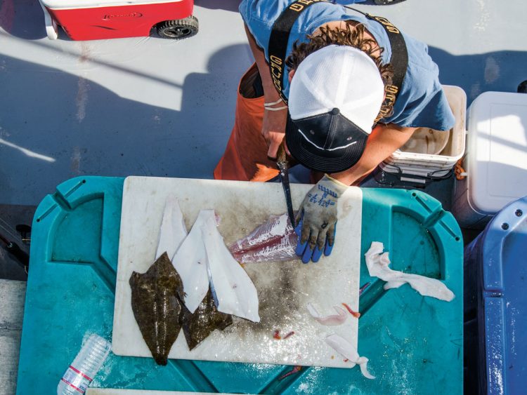 Headboat mates take great care when cleaning fish