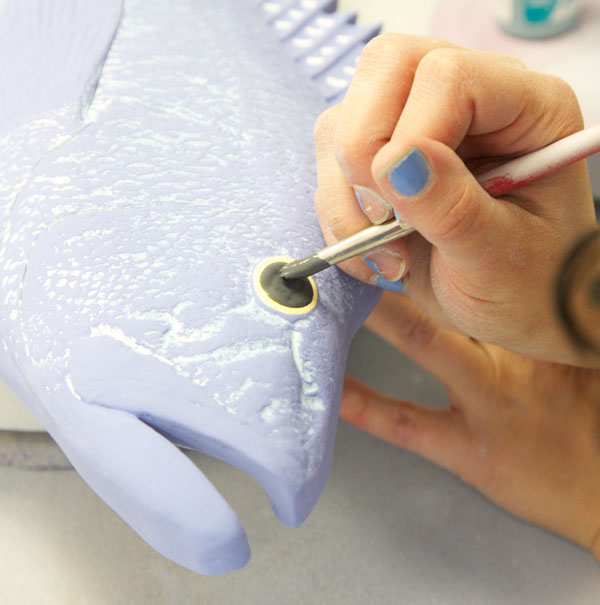 Grainger Pottery seabass being painted