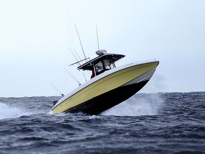 boat running in rough surf