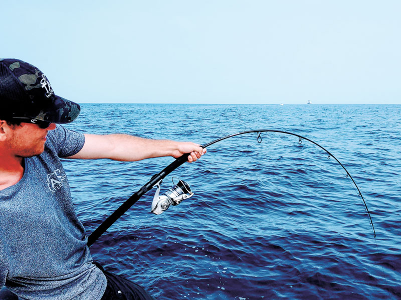 bluefin putting a major bend in the rod