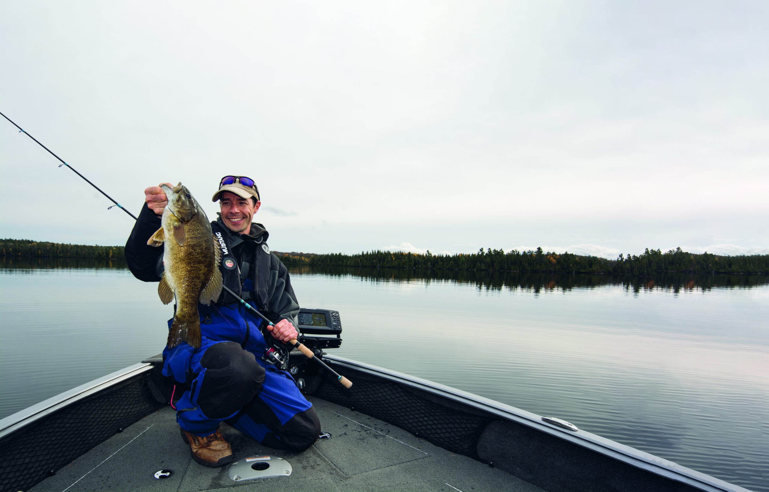 A winter smallmouth bass guide detailing the best places to find them at lakes, what lures to use, techniques, tackle, and more.