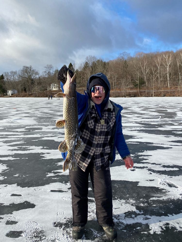 Angelyna Custodio holds a 5-pound northern pike.
