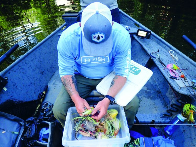 Pike flies are tied in three parts: bucktail establishes a base; hackle feathers add length, profile, and motion; and flash increases the attractiveness.