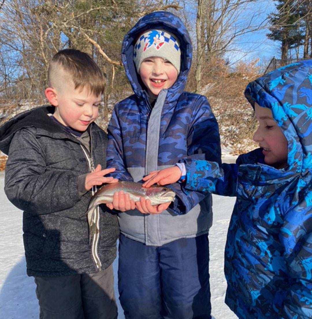 kids with rainbow trout