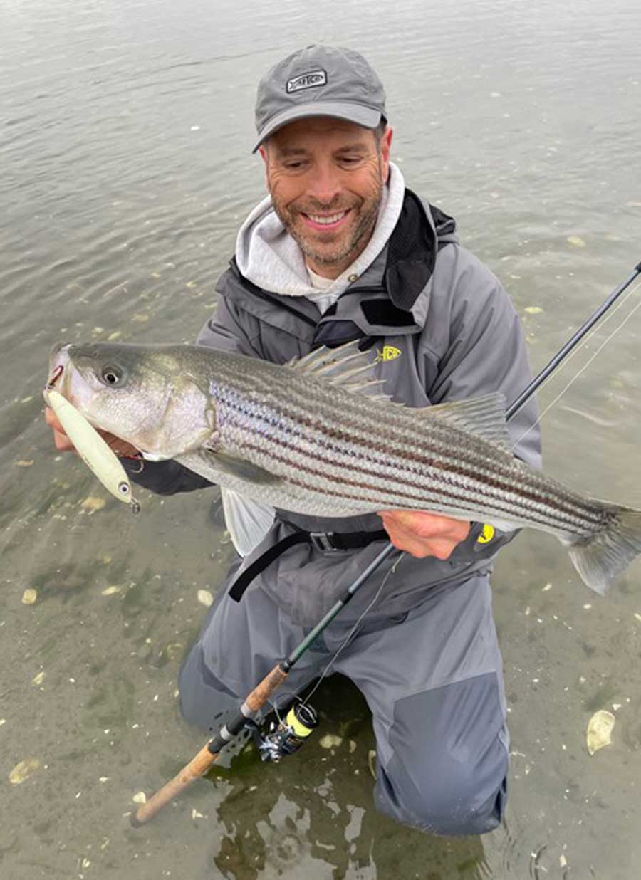 Ron with schoolie striper