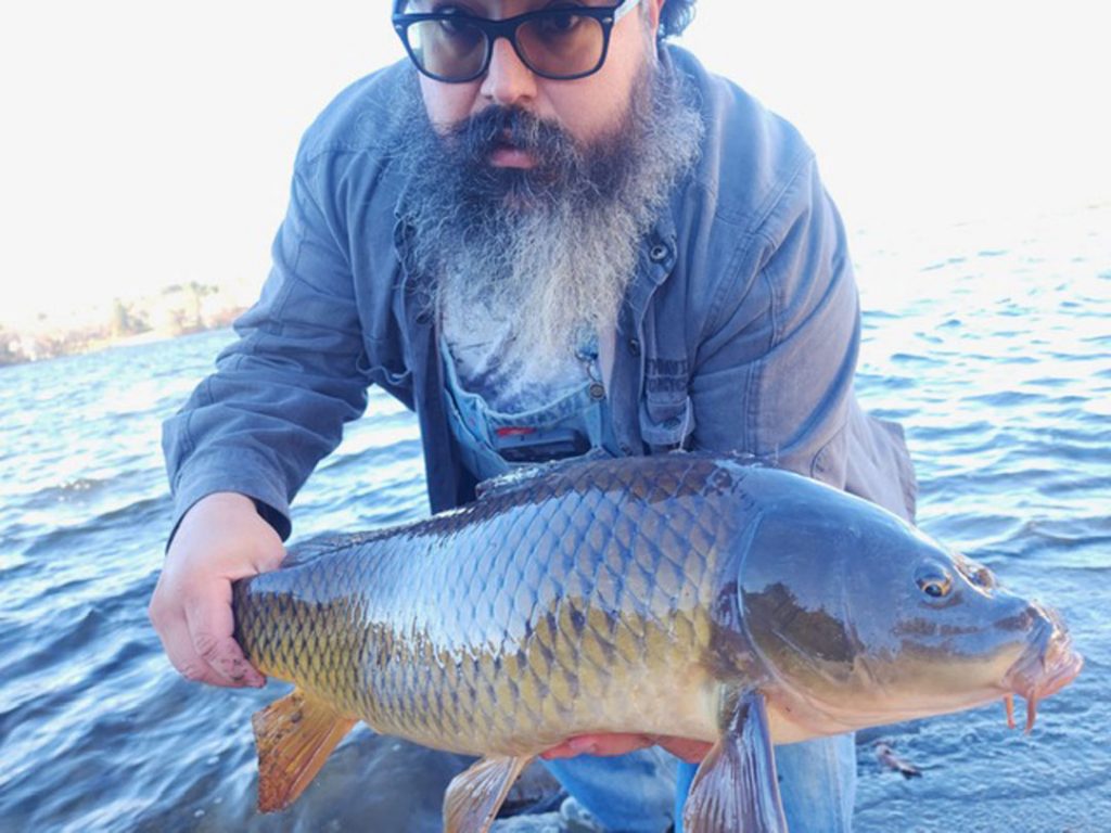 Captain Anthony Forte with Charles River carp