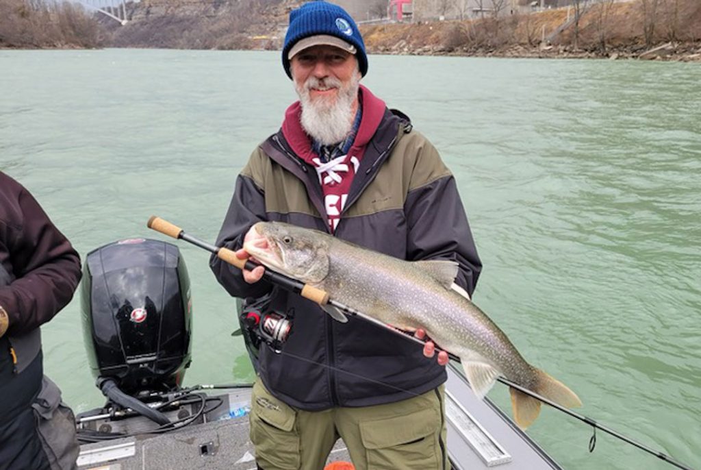 Mark Smith with a lower river lake trout