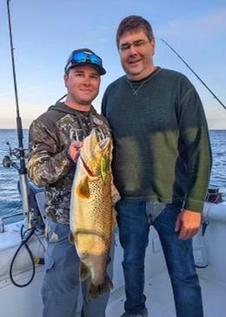 Jared Chlus and dad brown trout