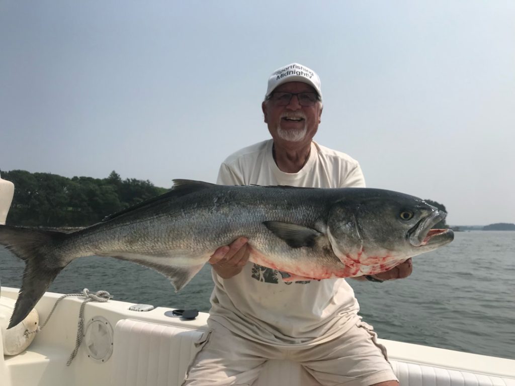 Captain Roger Brousseau with big bluefish