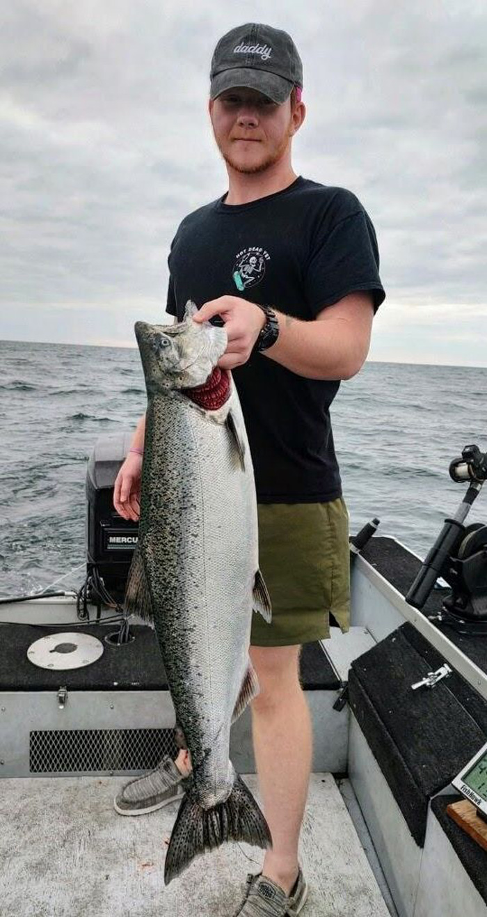 Hunter with king salmon