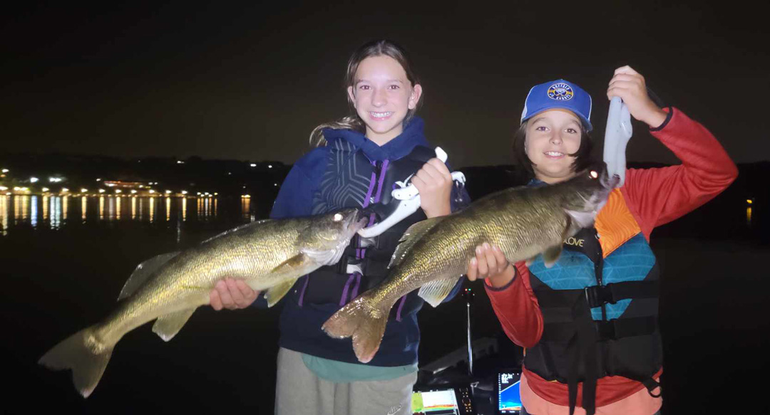Kara Parete of Lancaster and her brother Caleb with lower Niagara River walleyes