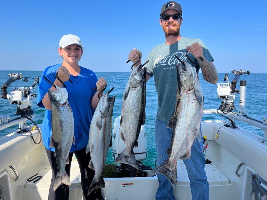 Heather and Rick aboard Get the Net Fishing Charters