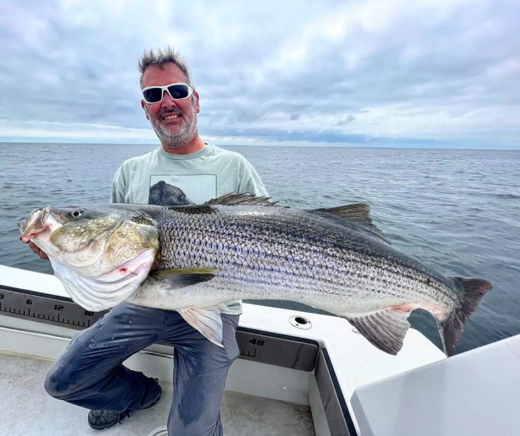 Big striped bass caught aboard Reel Cast Charters