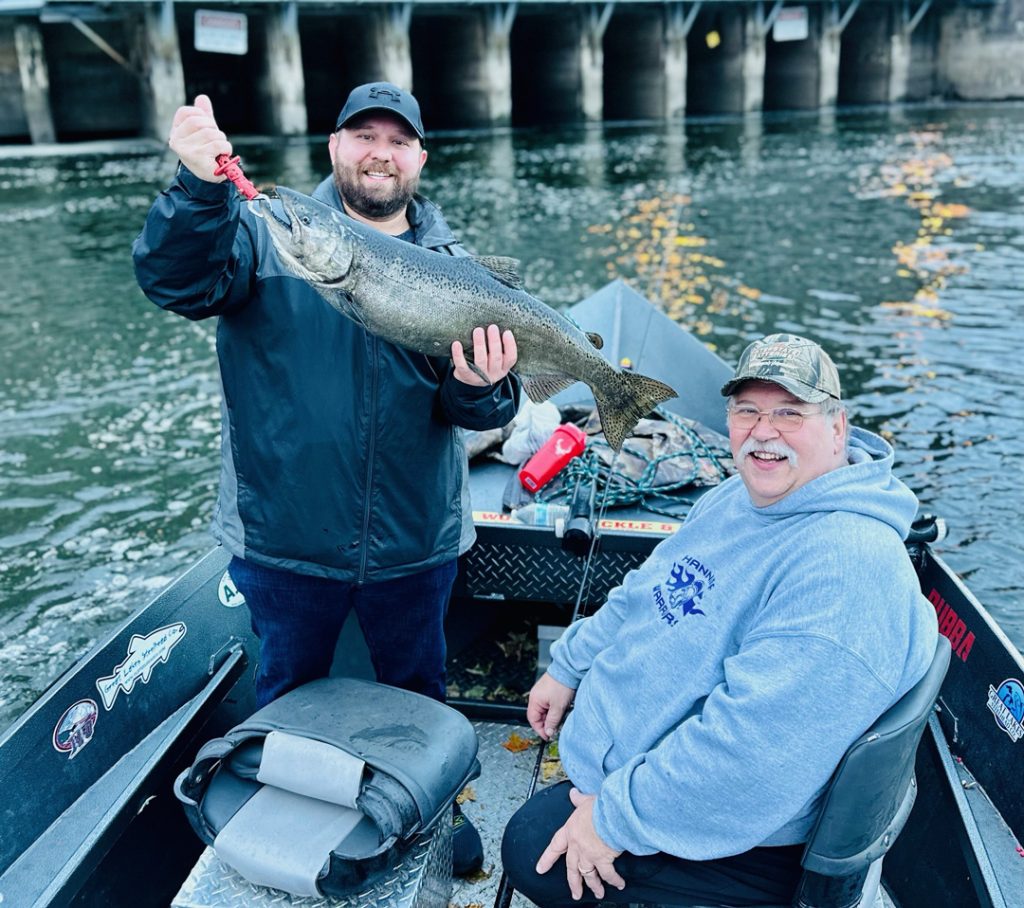 Father and son landed this kind salmon