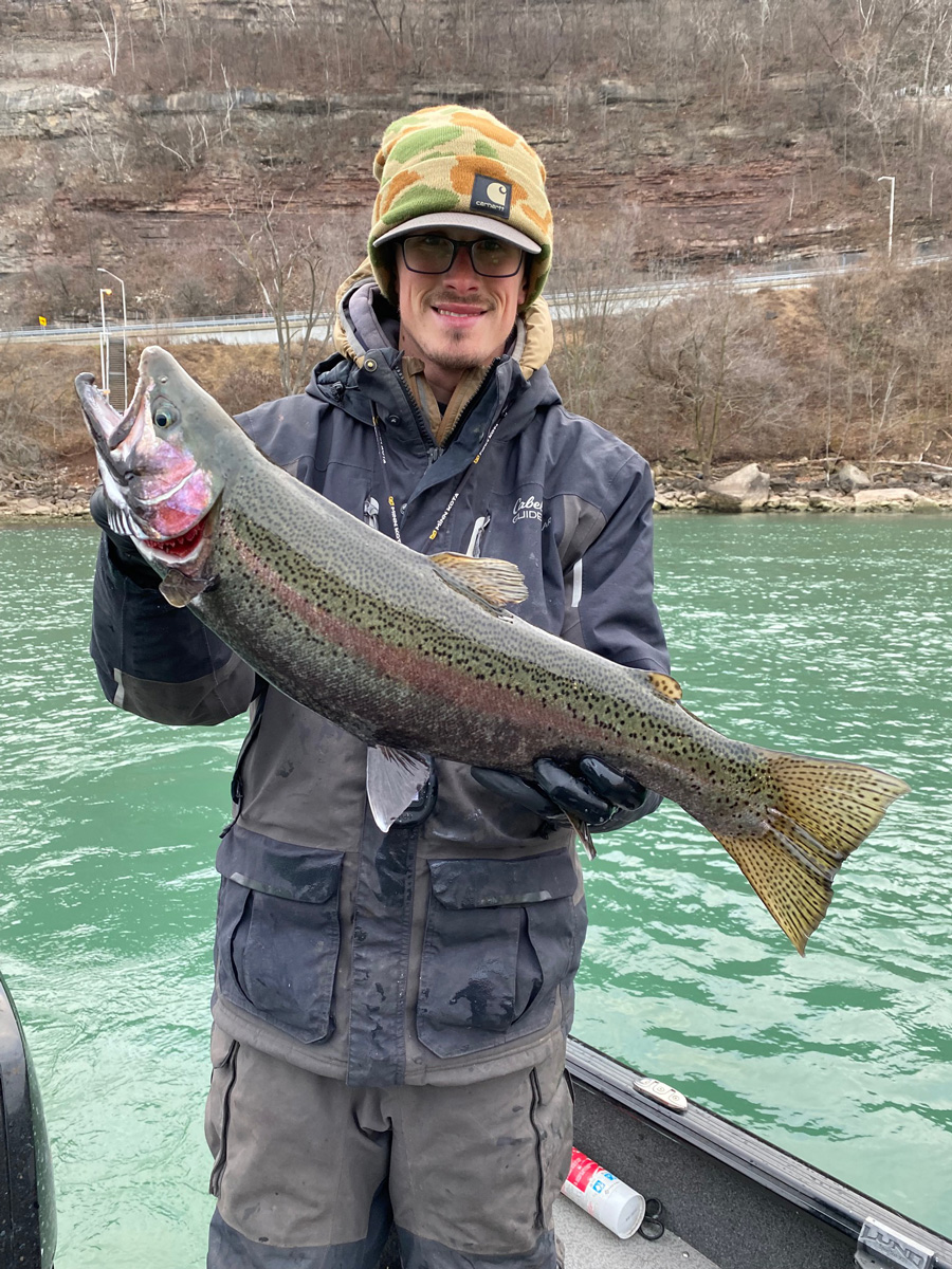 Capt. Connor Cinelli with steelhead