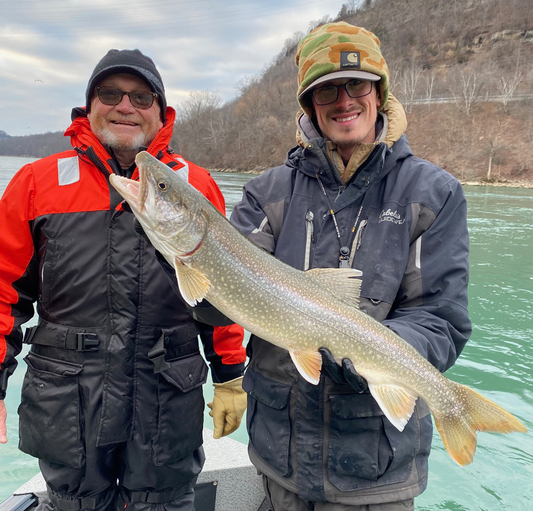 Capt. Ned Librock and Captain Connor Cinelli with lake trout